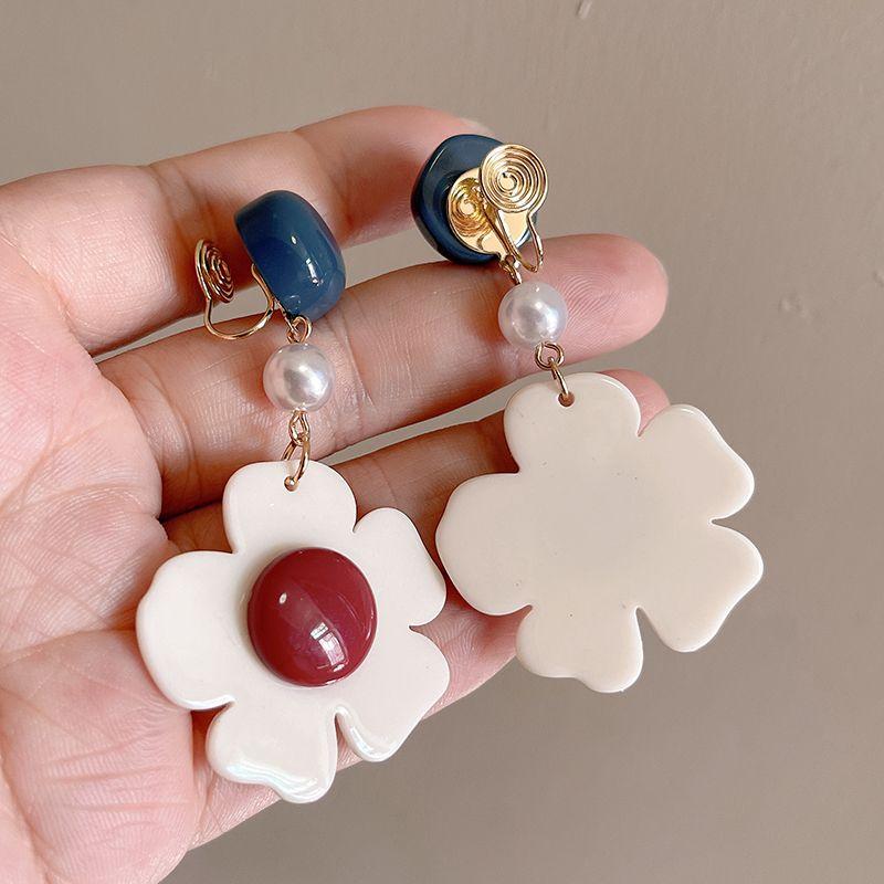 

Самый простой для пудры Match Oil Series Ретро Гонконгский стиль Клипса для ушей в виде москитной спирали E695 flower mosquito coil ear clip pair