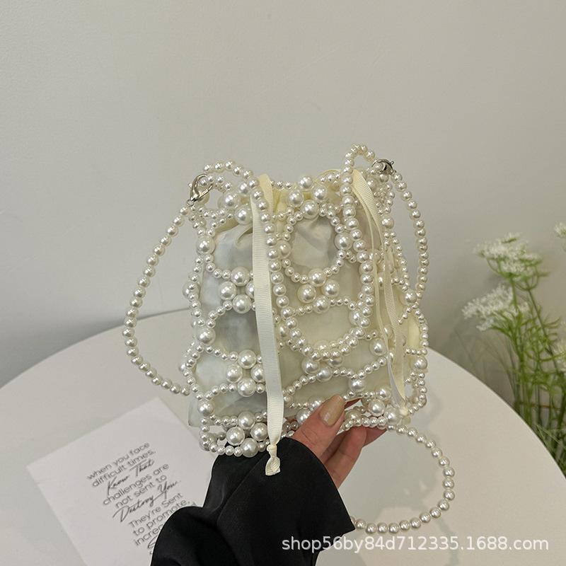 Niszowa ręcznie robiona torebka z koralikami z pereł retro wiaderko niszowa tkana torebka ażurowa torebka z koralików 2025 wiosna nowa ling