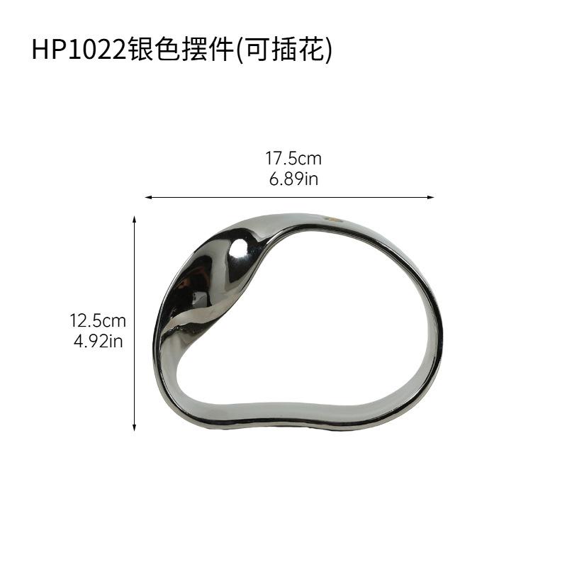 

Creative Ceramic Silver Vase Geometric Ornaments Circular Hollowed-out Flower Arrangement Three-dimensional Ribbon Lines