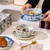 Klasický modrobílý porcelánový šálek a podšálek Dvouuchý hrnek Hrneček na kávu Stolní mísa Nádobí Jídelní stůl Odpolední čaj Šálek na čaj
