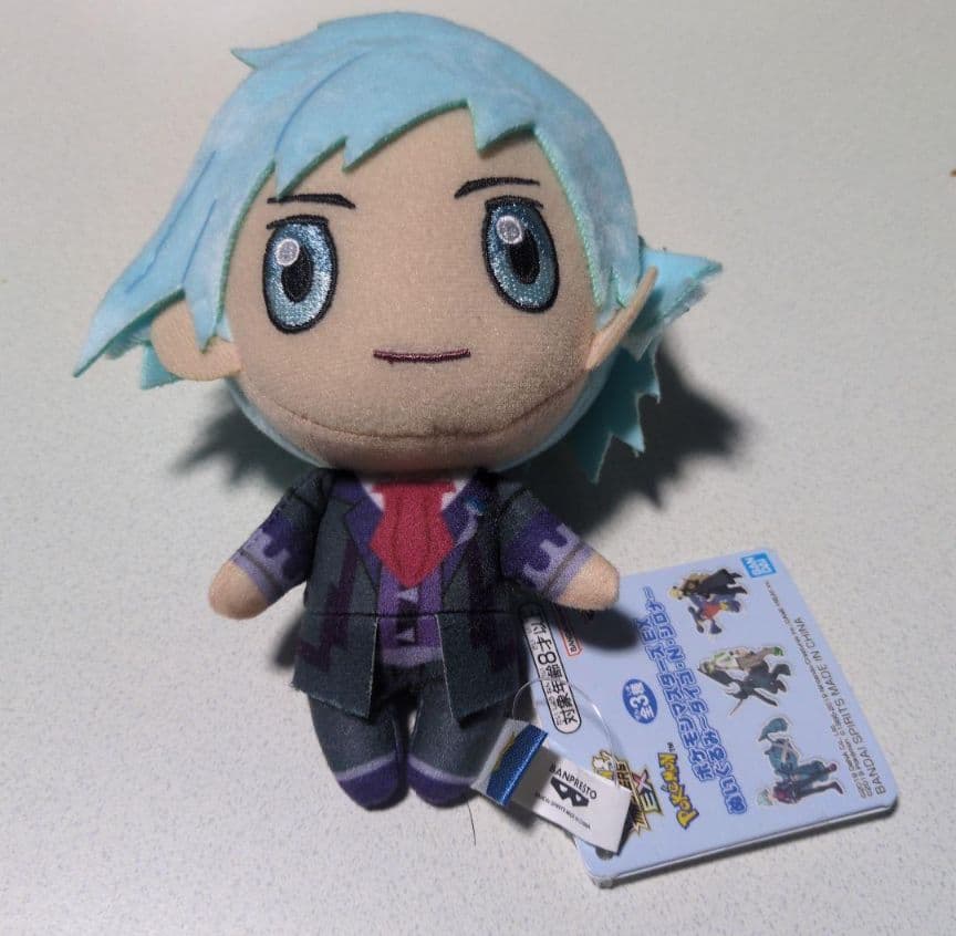 Pokemon Masters EX plush toy Daigo brand tag attached.