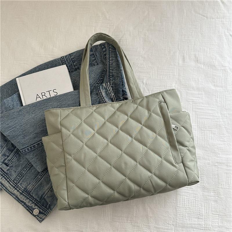 

Премиальная сумка женская осенняя новая сумка подмышку для通勤 модная простая нишевая дизайнерская плечевая хлопковая сумка