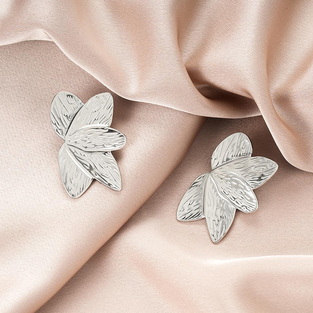 

Stainless Steel Metal Flower Leaf Stud Earrings for Women 2026 New Trendy Daily Wear Earrings Jewelry for Women Wholesale