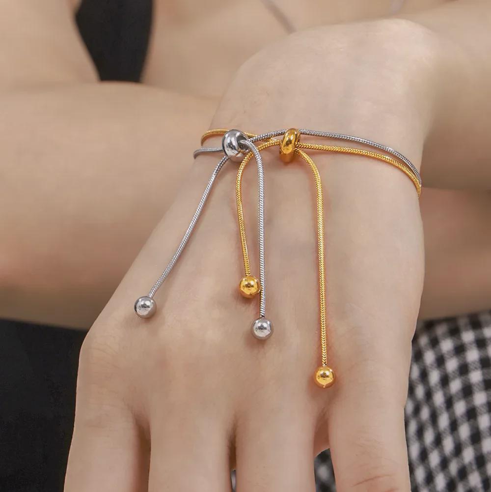 Stylish Non-Fade Round Bead Pull-Out Buckle Women’s 18K Gold-Plated Titanium Steel Jewelry Set: Tassel Necklace, Bracelet, Anklet.