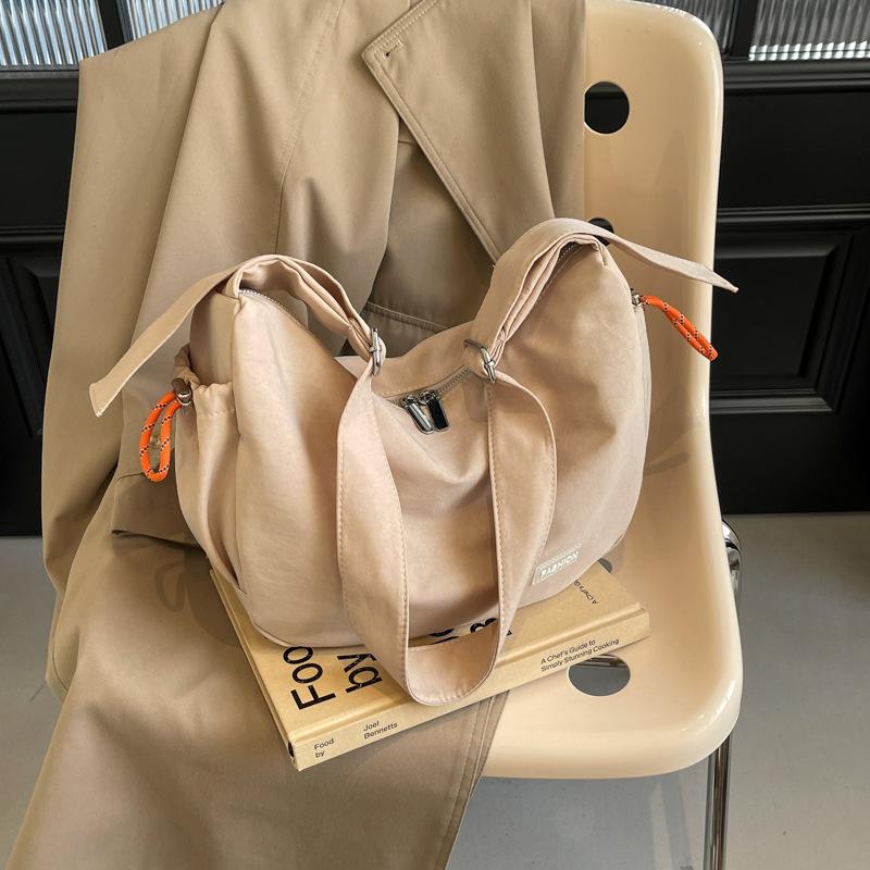 

Casual big bag women s 2024 new super popular cloth bag shoulder bag large capacity messenger commuter dumpling bag хакі