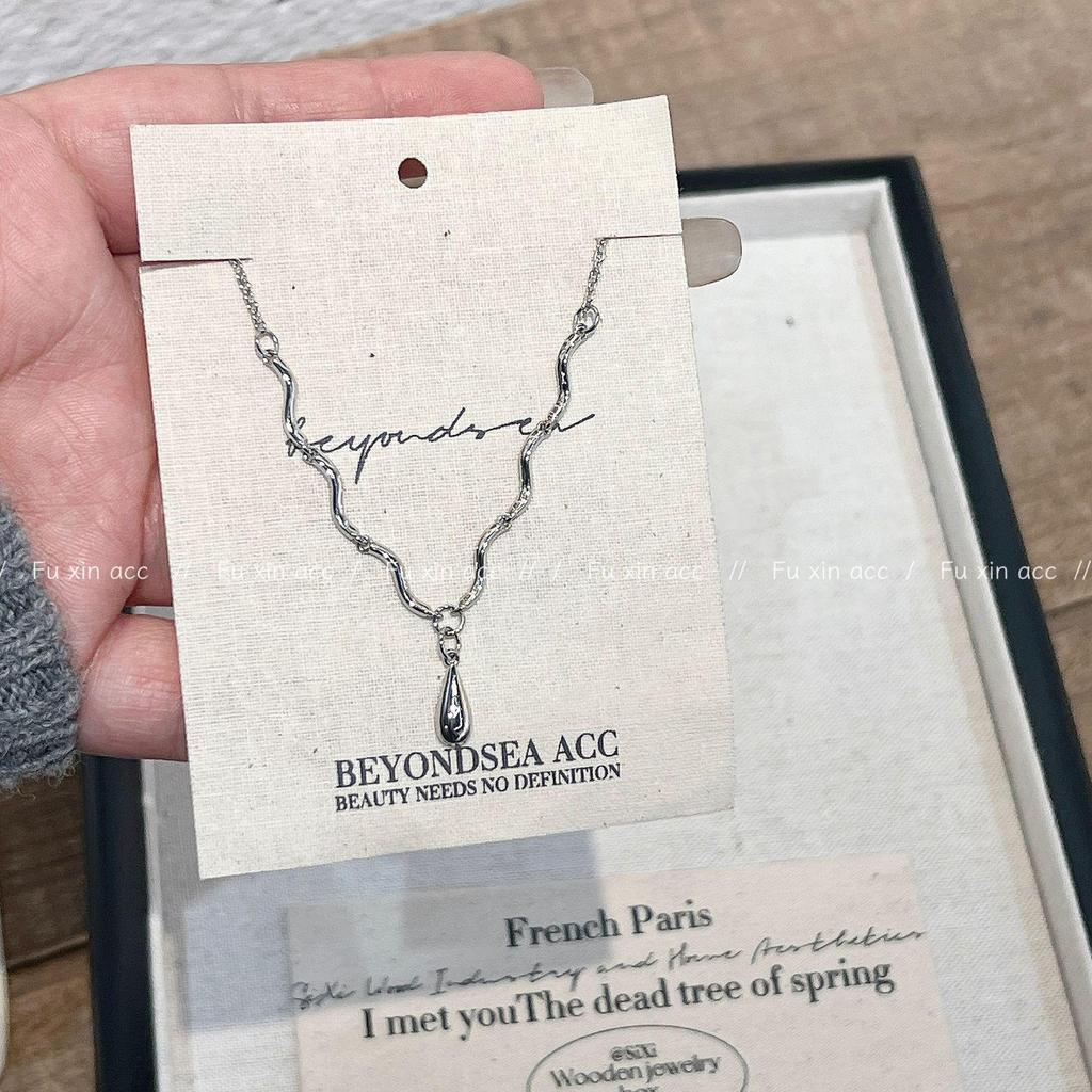 Retro Wavy Water Drop Necklace: Euro-American Style, Neutral, Gold & Silver Sweater Chain.