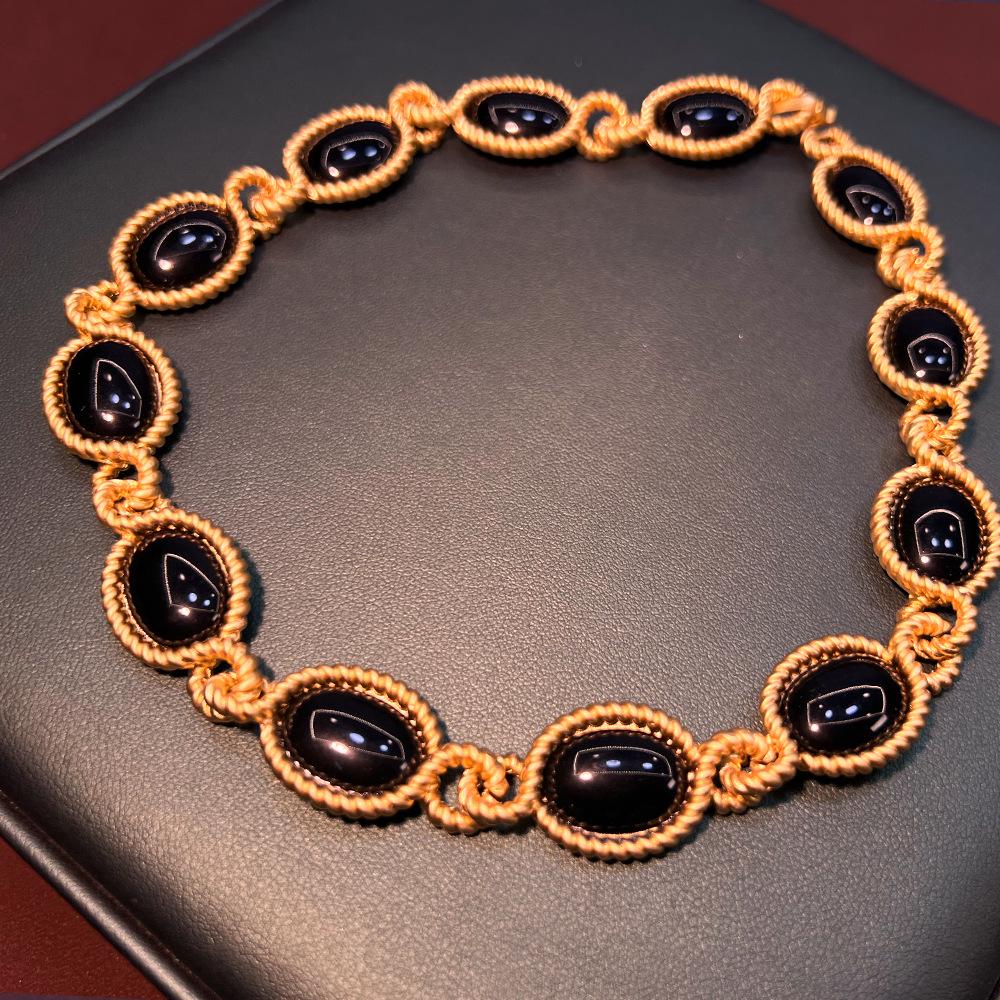 

Винтажный ювелирный набор середины века: Ожерелье и серьги из черного обсидиана с позолотой