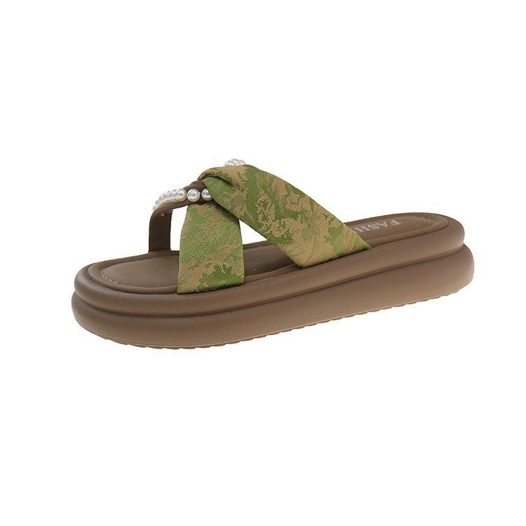 Thick bottom heightening outer wear one-word slippers female 2025 summer new fairy wind French beach pearl cool slippers
