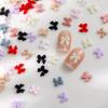 50Pcs Bow Resin Nail Art Decoration 3D Cream Color Bowknot Nail Charm Ornament Jewelry Diy Manicure Classic Accessory