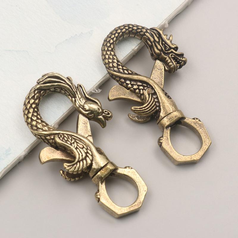 

Vintage Dragon Phoenix Head Figurines Small Ornament Retro Brass Animal Car Key Chains Crafts Office Desk Decoration Accessories
