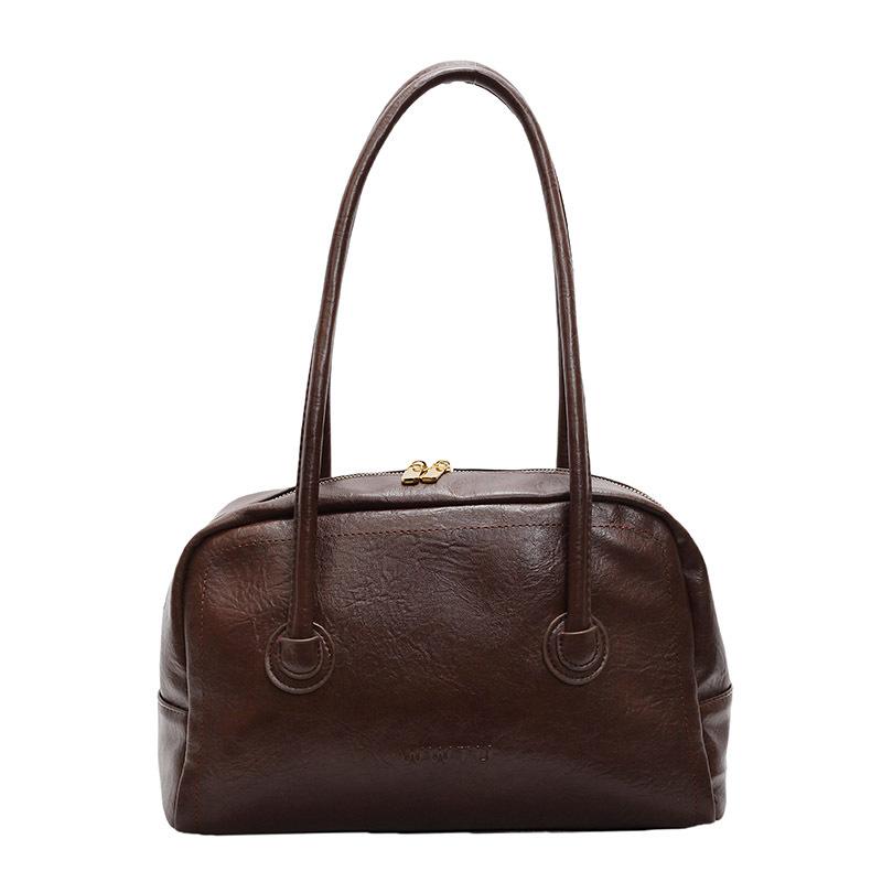 

Niche underarm bag women s spring new high-end commuting large-capacity shoulder handbag темно-коричневого