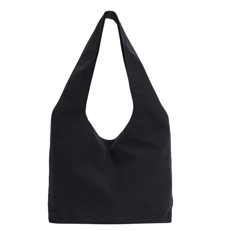 

Retro casual commuter tote bag women s 2026 spring new texture niche simple shoulder armpit bag 43*9*30 чорний
