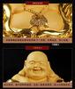 Hotei, one of the Seven Lucky Gods, is a gold-colored Buddhist figurine perfect for warding off evil, bringing good fortune, and bringing good luck. T
