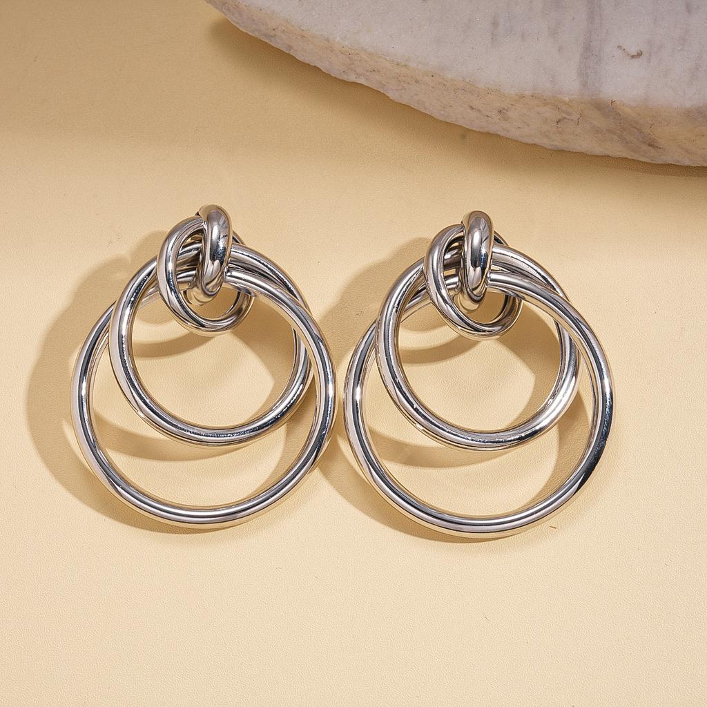 Geometric round winding hollow steel needle earrings environmentally friendly niche earrings