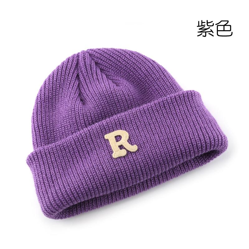 Women's Solid Color Letter Print R Rolled brim knitted hat for outdoor cycling, providing warmth, cold protection, and ear coverage