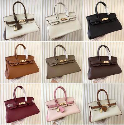 Leder weibliche Baotou Schicht Rindsleder Unterarmtasche horizontale niedrige Version der passenden Farbe Goldschnalle Handtasche