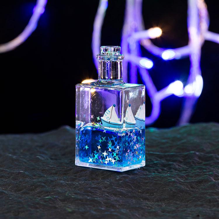 

Creative Floating Liquid Timer Square Bottle for Desktop & Children s Gift