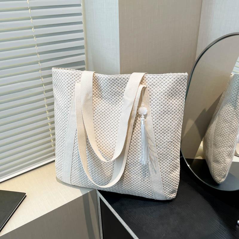 

2025 Новая женская летняя соломенная сумка Модная универсальная сумка под мышкой Сумка на плечо Летняя соломенная сумка Сумка-тоут Without pendant