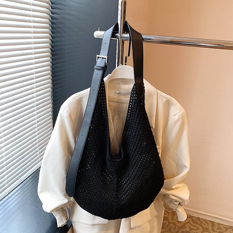 Summer niche fashion versatile woven rope hollow tote design mesh pocket portable child and mother bag shoulder bag