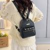 Schoolbag fashion PU travel small backpack storage Korean version lady temperament rivet small backpack trend small backpack