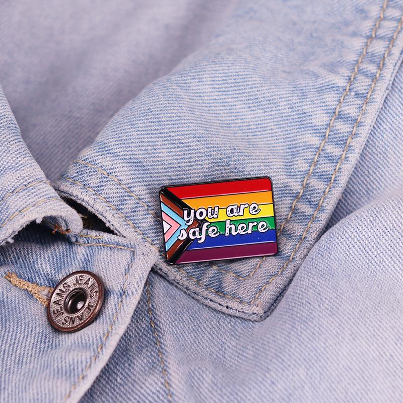 Safe Here Brooch: Crossed Flags Enamel Badge