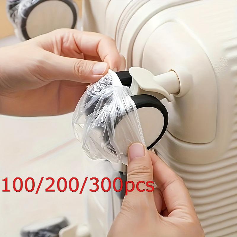 100/200/300 piezas Cubiertas de Ruedas de Maleta de Plástico Transparente, Protectores de Polvo Desechables para Maletas de Viaje y Ruedas Giratorias, Diseño Transparente