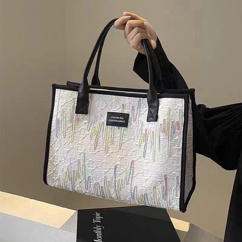 Fashion Trend Embossed Handbag 2025 College Student Versatile Large Capacity Commuting Appearance Handheld Canvas Shoulder Bag