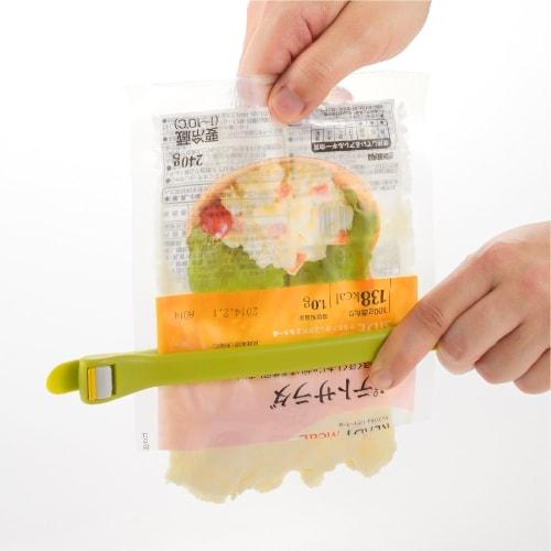 Akebono Sangyo Green Cutter, Made in Japan. Open pouches and squeeze contents without getting your hands dirty. Grab and remove retort pouches from bo