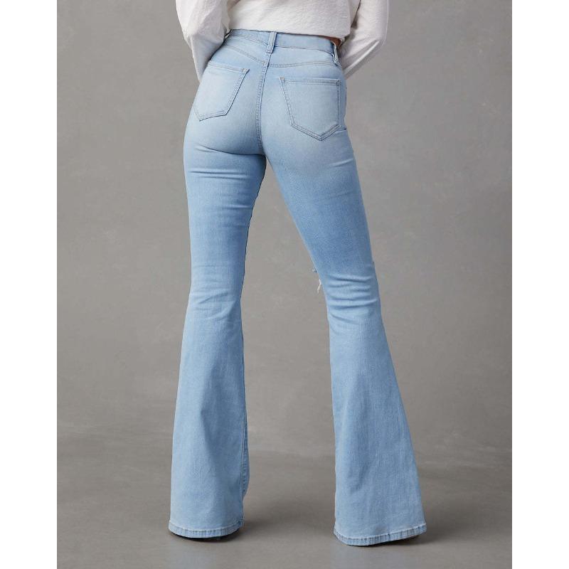 Wiosenne letnie damskie dżinsy z wysokim stanem i dziurami Street Spice rozkloszowane spodnie długie spodnie