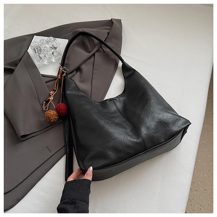 

Large-capacity bag women s 2025 new versatile lazy high-end shoulder messenger bag commuter tote mother and child bag
