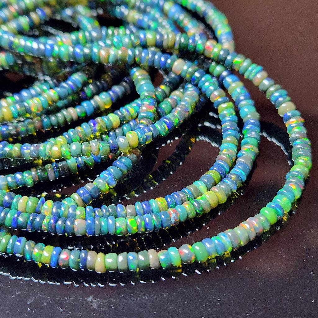 Smooth Polish Rainbow Flashy Rondell Ethiopian Opal Beads, Black Opal strand beads.