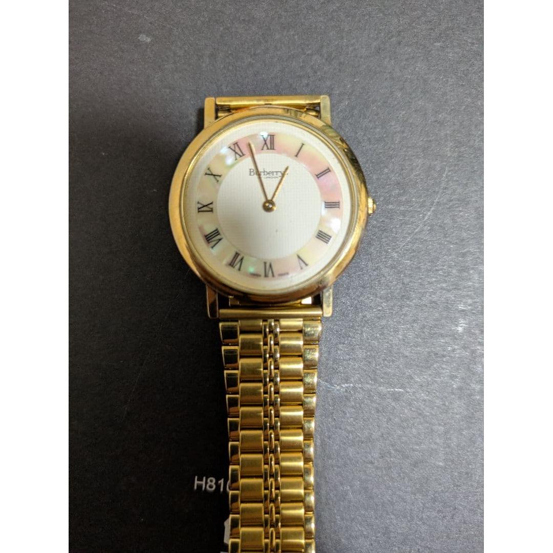 Used Burberry watch gold color