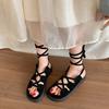 Fashion lightweight explosion black retro flat sandals women's 2025 new summer wear versatile Roman sandals