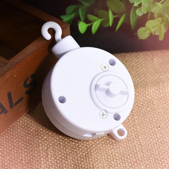 Baby Crib Bed Hanging Bell Wind-up Rotating Music Box Kids Develop Toy Gift
