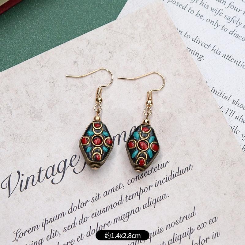 

Handmade niche Nepalese exotic Tibetan earrings retro temperament simple earrings show face thin earrings