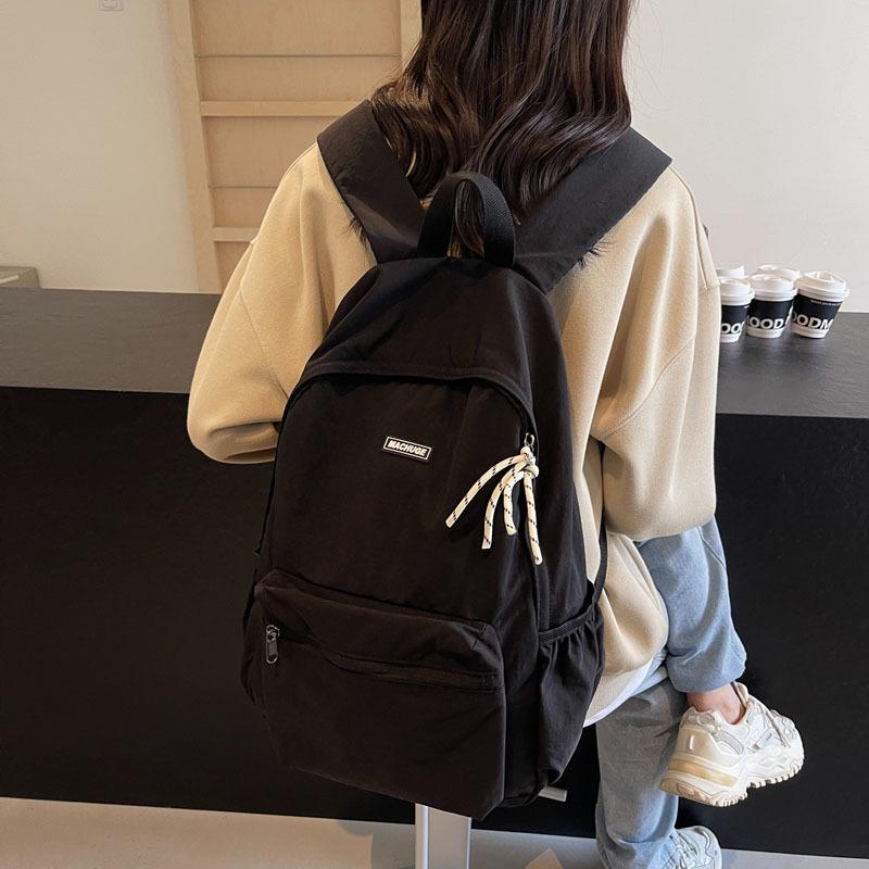 Simple and fashionable large-capacity backpack 2025 new leisure niche college class schoolbag women's solid color backpack