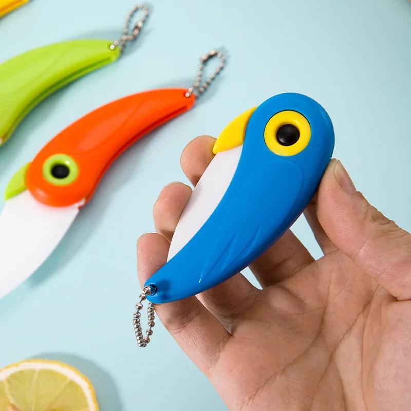 1 Stück Tragbares Faltkeramikmesser Mini Gemüse Küchenschneider Schäler Multifunktional Vogel Picknick Mittagessen Schneiden Scheibe Obst Besteck