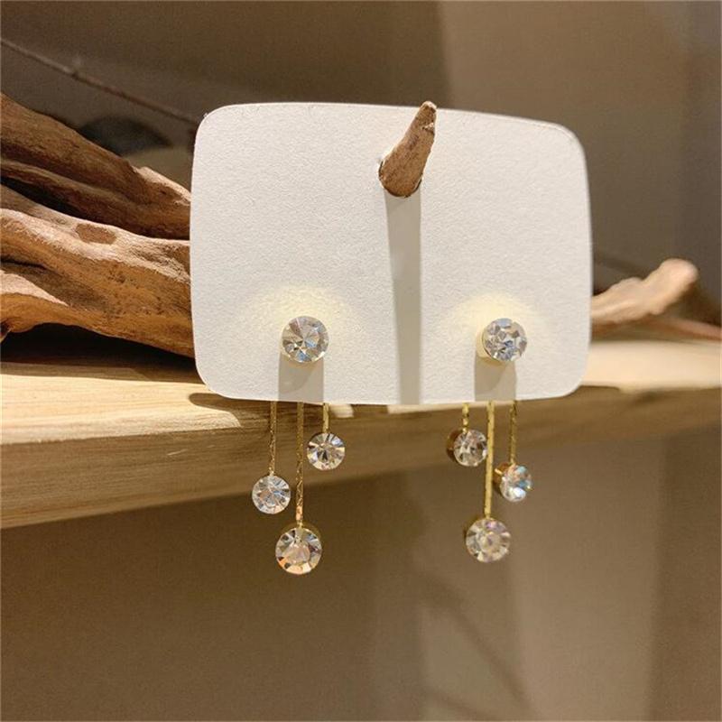 

Двойные серьги с жемчугом и цирконом с кисточками