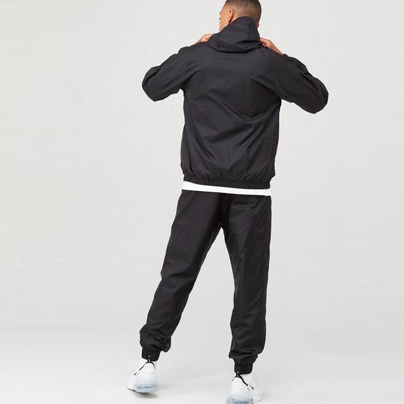 Nike Pánská sportovní souprava s vyšívaným logem, jednobarevná, černá BV3025-010