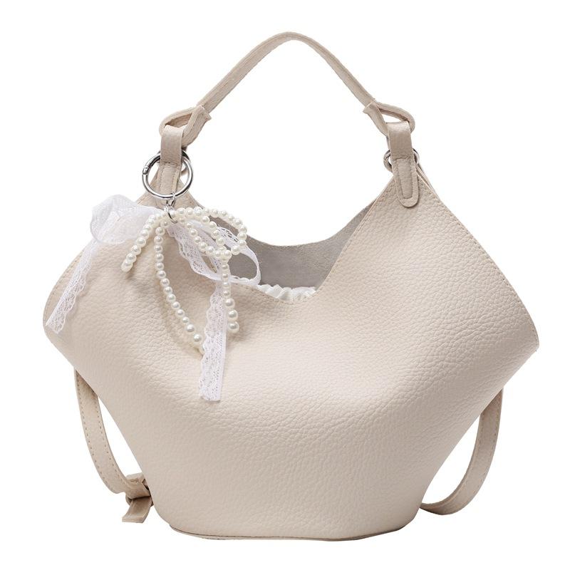 This year, the Korean version of the simple lychee pattern portable mother and child bag is popular, high-end, lightweight and versatile fashion mess