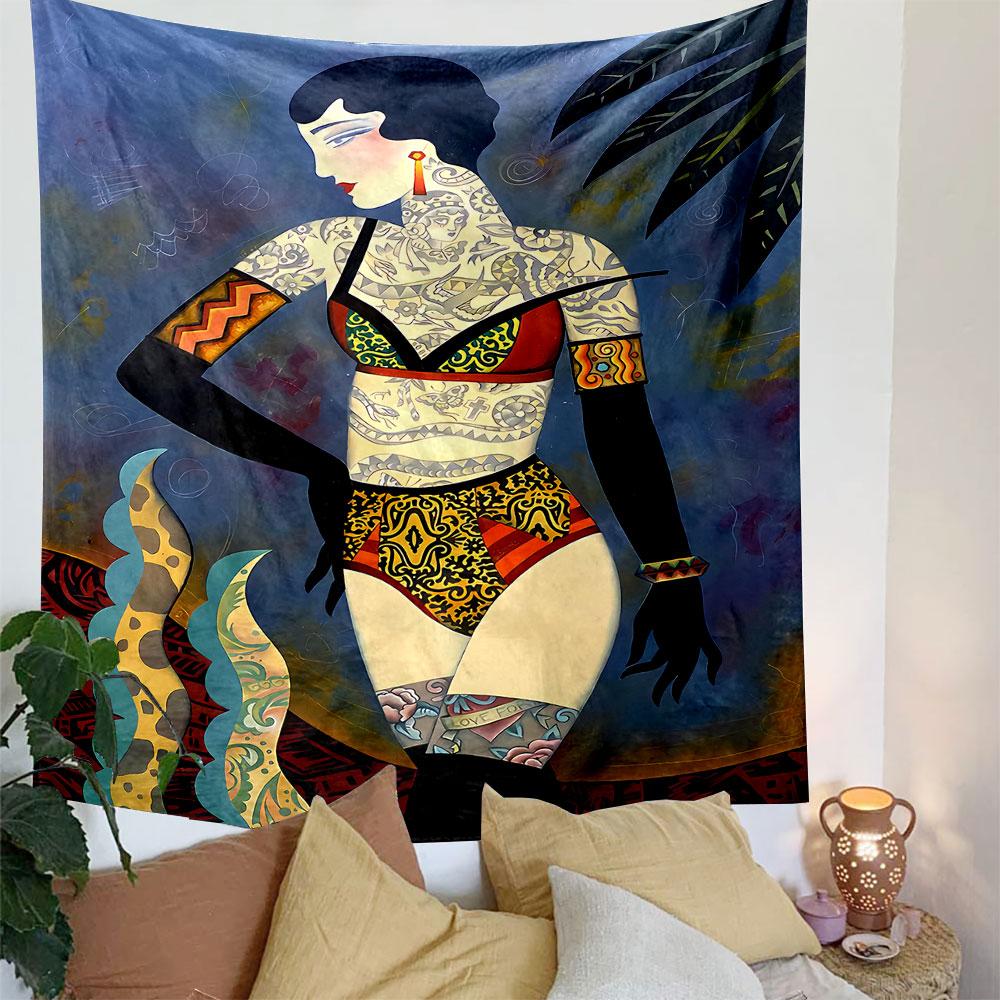 Tattooed woman in bold patterned swimwear with decorative surroundings. Patterned tapestry for bedroom and living room home decor