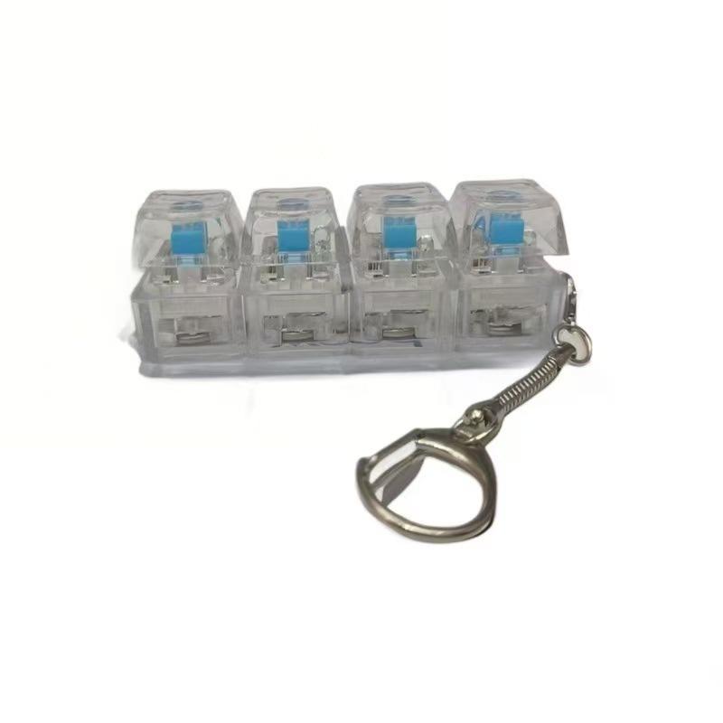 Reißverschluss Vier-Tasten Ein-Schriftzug Mechanische Tastatur, Schaltertester, Fingerquetsch-Musik-Dekompressionsknopf, Schlüsselanhänger, Buntes Glitzern