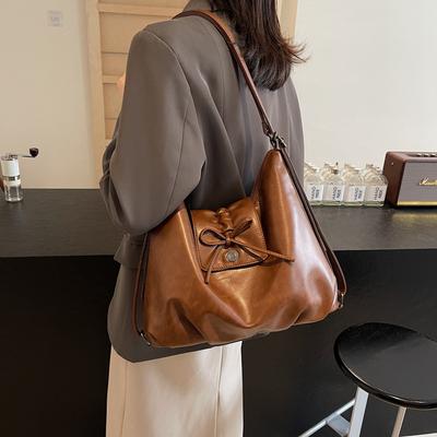 Koreanische Version modischer Pendler-Rucksack mit großem Fassungsvermögen Damen 2025 Herbst und Winter neu einfache Schmetterlings-Tragetasche vielseitige Damentasche