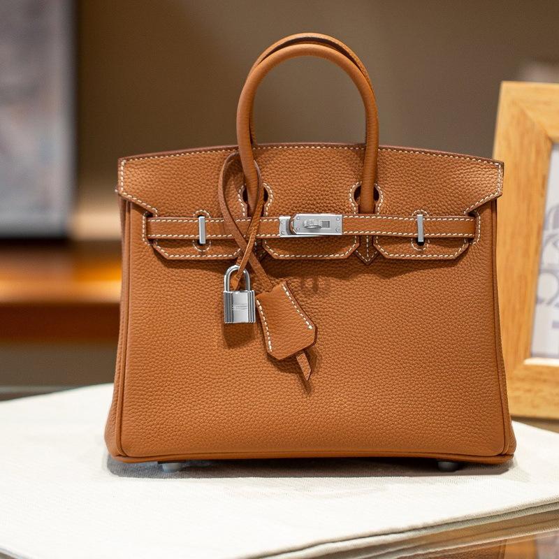 Gold buckle silver buckle top layer cowhide togo leather platinum bag (togo-2530BK)