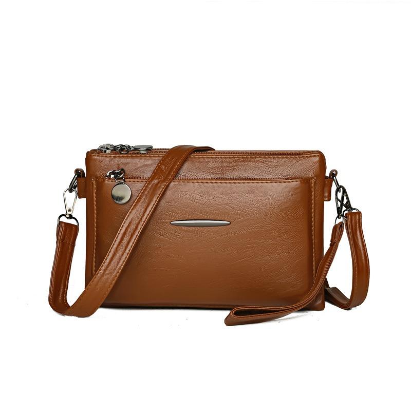 Umhängetasche mit einem Schultergurt für Mobiltelefon und Kleingeld