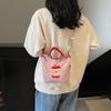 Japanese embroidery cute apple bucket bag girl 2025 new mobile phone bag versatile commuter shoulder messenger bag