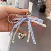 Women Fashionable Bow Keychain Shaped Pearl Mobile Phone Charm, Bag Charm And Accessory.