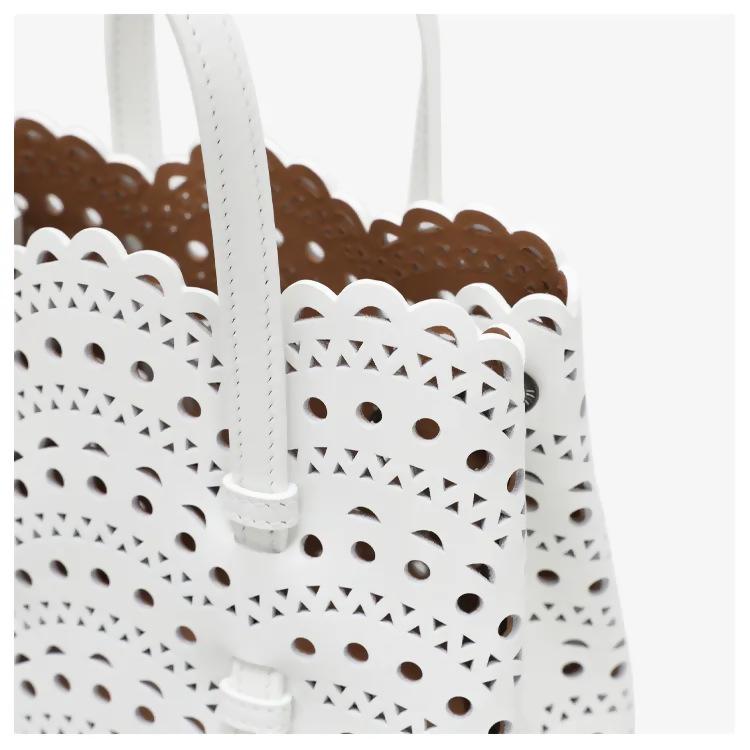 Dámská crossbody kabelka z ručně broušené hovězí kůže, laserově řezaná, z pravé kůže