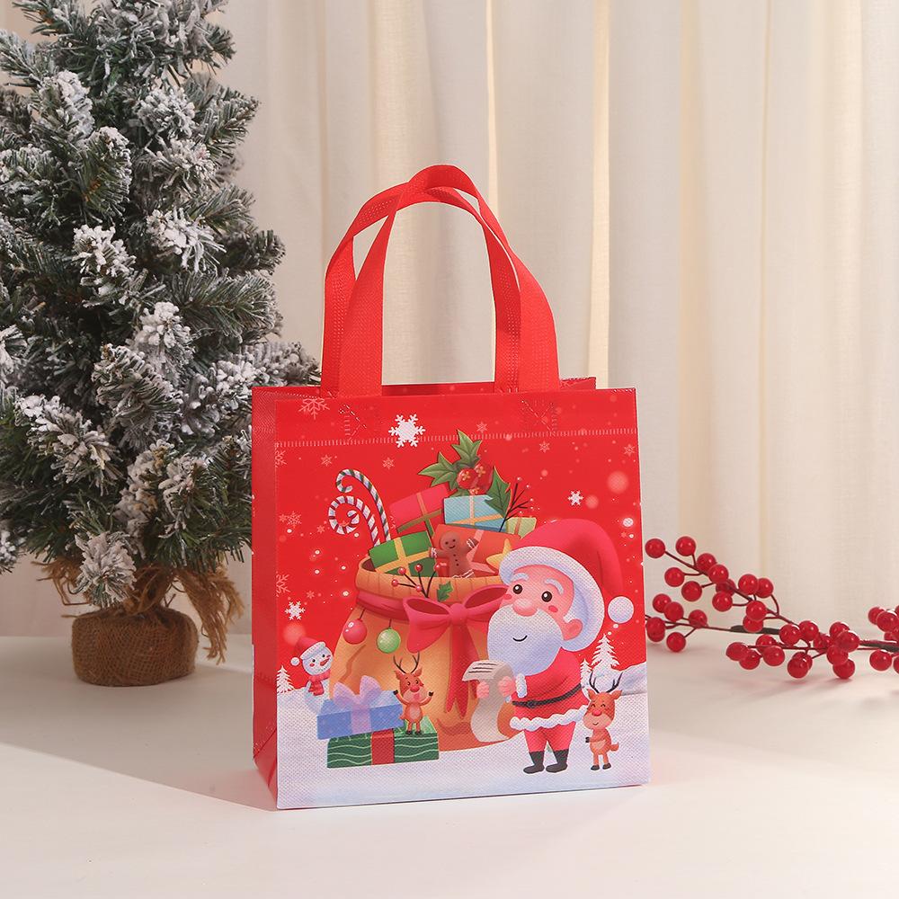 12/30pcs Christmas non woven tote bags reusable gift bags with reindeer print for kids candy cookies and treats party supplies