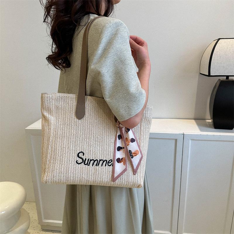 Woven large-capacity bag women's 2025 new spring commuter letter tote bag silk scarf versatile shoulder armpit bag